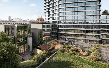 Buitenkant van een modern kantoorgebouw op Avenue Louise / Louizalaan 149, Brussel Europese Wijk. Dit moderne pand biedt een aantrekkelijke optie voor kantoorruimte te huur met groene omgeving en stedelijk uitzicht.